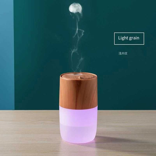 Humidifiers Household Air Humidifier Purifier LED Seven Color Ambient Light Decoration Bedroom Office Car Flame Aroma Diffuser 900ML Y240628